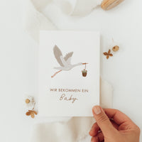 Postkarte Wir bekommen ein Baby - Storch - A6